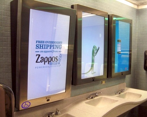 Chicago's O'Hare Airport's Bathroom Mirror Ads (Image courtesy Jaunted)