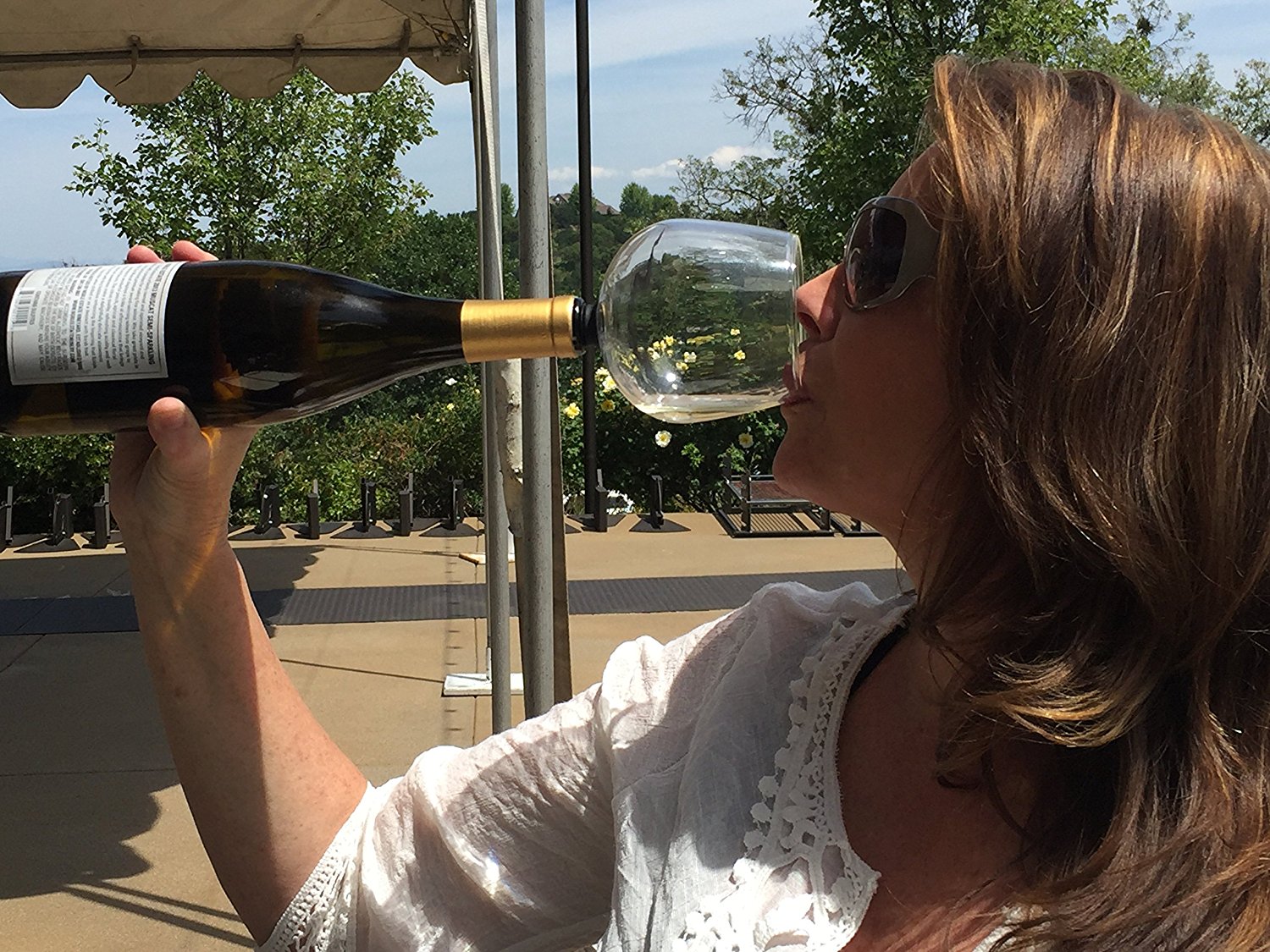 Class Act: Guzzle Buddy Attaches To The Bottle, So Drinking Straight From It Isn’t So Bad